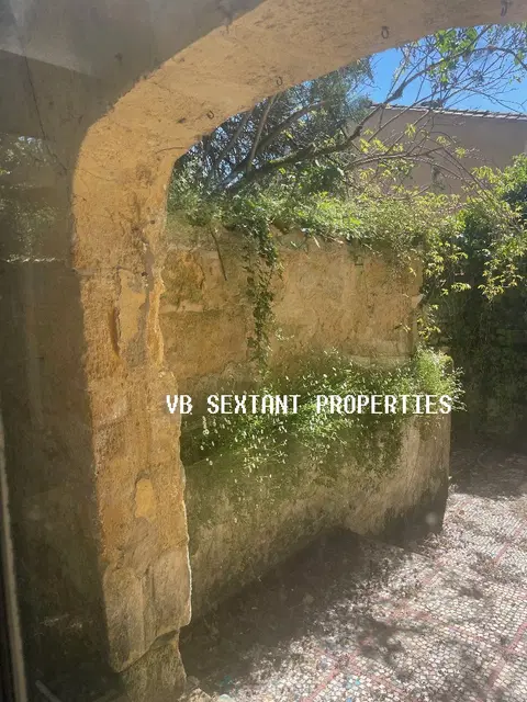 Photo of maison en pierre · LANGOIRAN
