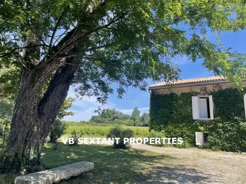 Photo of 35 minutes from Bordeaux, charming property.1.5 hectares with beautiful residence and outbuildings