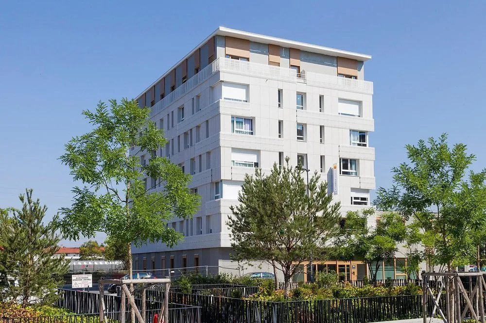 INVESTISSEMENT LOCATIF – ANNEMASSE – Résidence de Tourisme Nehô Suites – Porte de Genève – 6,98 % de rentabilité