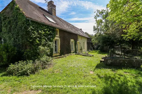 Photo of Large 5-bedroom family home offering superb living spaces and an exceptional outbuilding in a privileged setting.