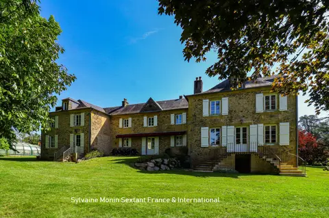 Photo of Superbly refurbished estate set on about 6.43 acres, featuring outbuildings and a pool area with a dovecote