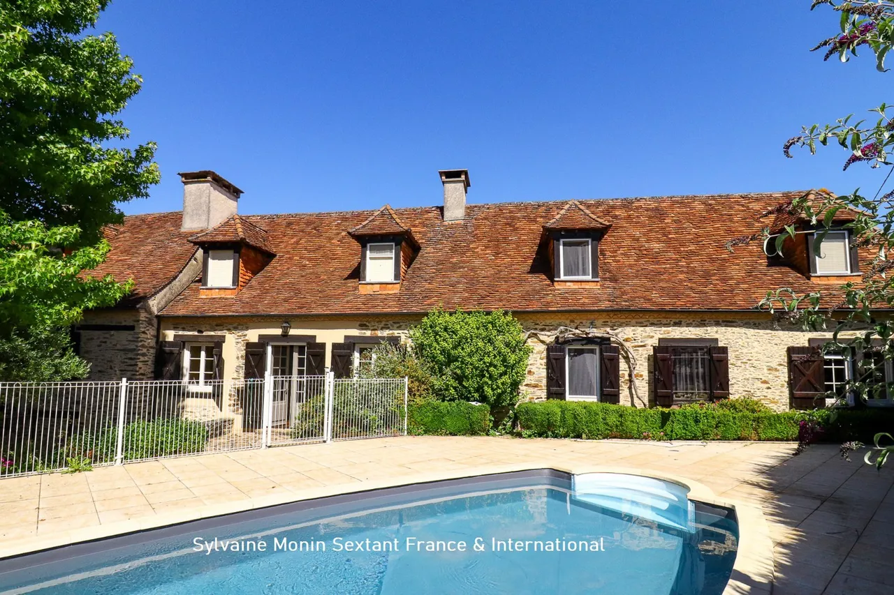 Character property in stone with swimming pool and barn, combining old-world charm and contemporary comfort