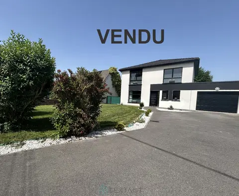 Photo of Modern individual house with garage.