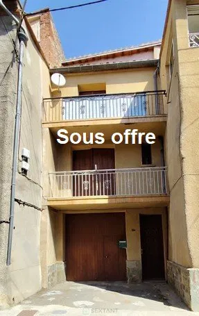 Village House with Garage and Balconies – Renovation Project